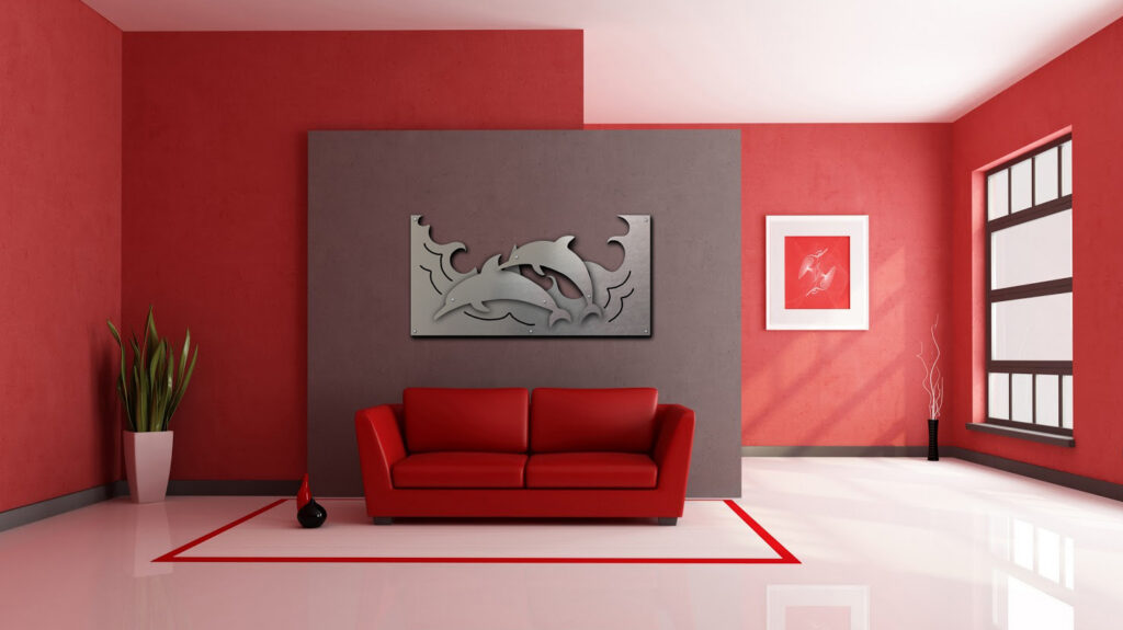 Red-themed room featuring a gray wall art of dolphins above a red couch, with plants and decorative items.