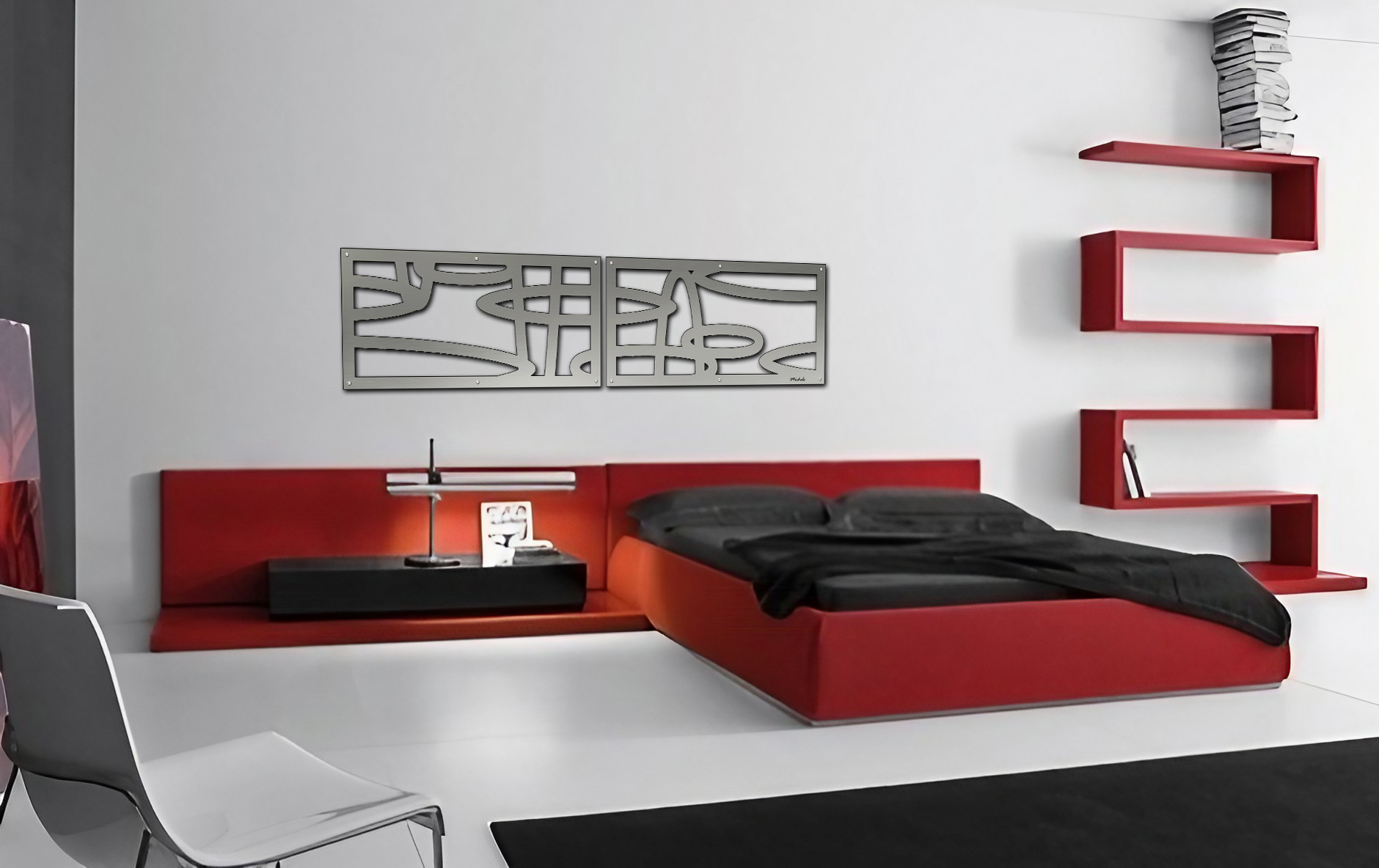Modern bedroom with red bed, black bedding, minimalist furniture, and abstract wall art.