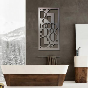 Modern bathroom features a freestanding tub, sleek sink, and decorative wall art. Snowy landscape visible outside.