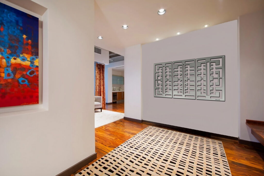 A modern hallway features abstract art, a patterned rug, and a glimpse of a living area with curtains.