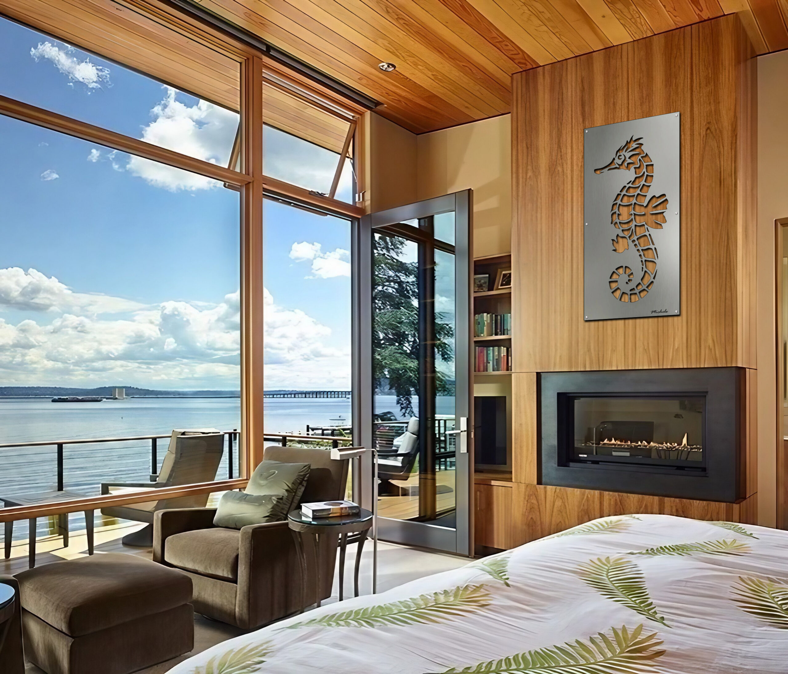 Coastal bedroom with large windows, seahorse artwork, and a view of the water and bridge.