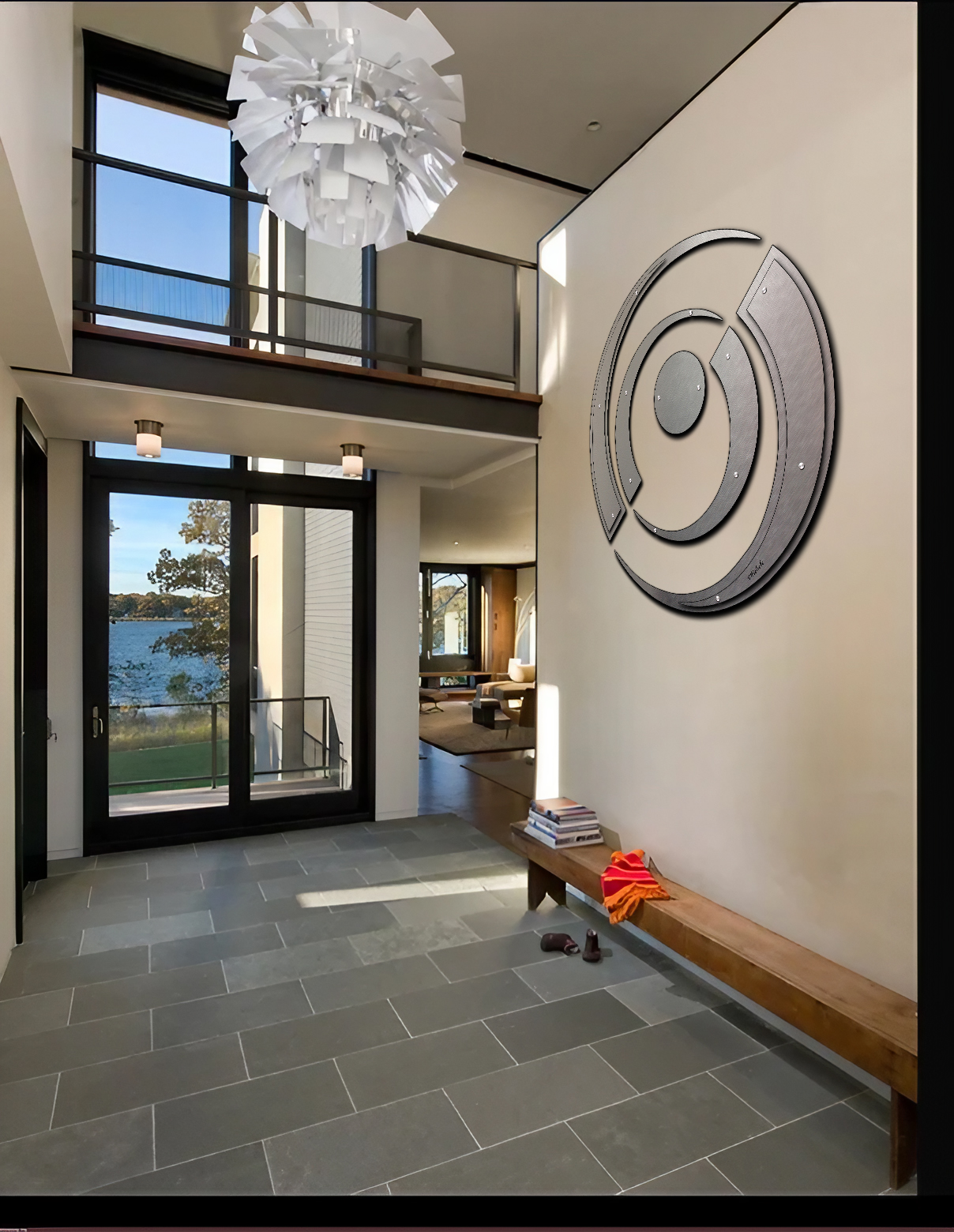 Modern entryway features a large wall art piece, a wooden bench, and natural light from large windows.