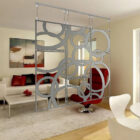 A modern living room features a decorative partition, red chair, white sofa, and dining table.