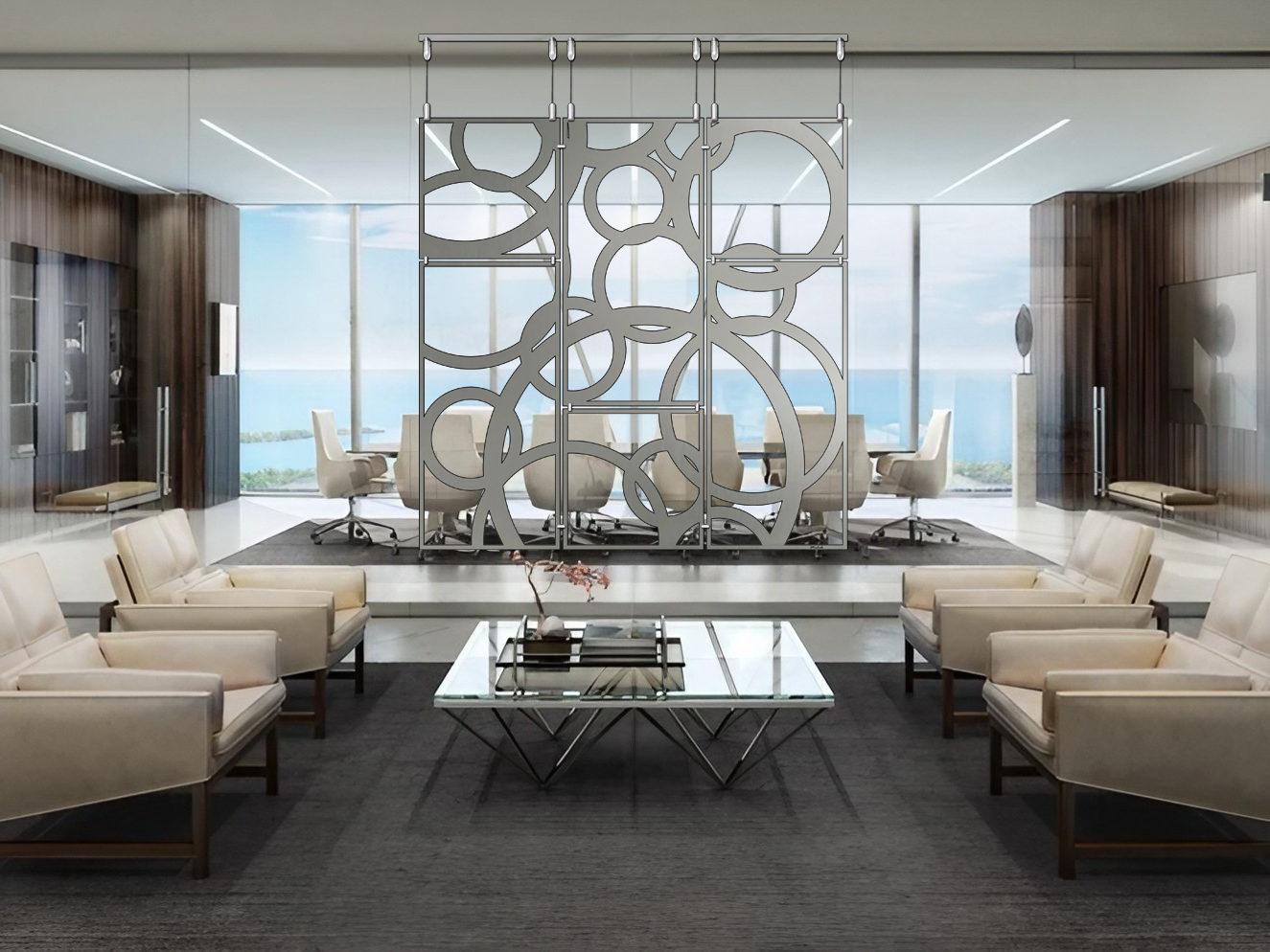Modern office interior with a glass partition, seating area, and a view of the ocean.