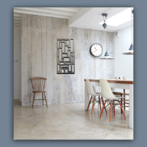 Minimalist dining area with a wooden table, white chairs, a clock on the wall, and contemporary art. Neutral tones and natural light create a serene atmosphere. Cold Edge Gallery text on the right.