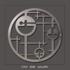 A round metal wall art piece featuring geometric shapes and straight lines is displayed on a gray background. Below the artwork, "COLD EDGE GALLERY" is written in stylized text.