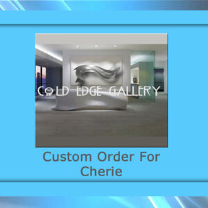 A white, abstract metal sculpture displayed in a gallery setting with the words "COLD EDGE GALLERY" overlaid. The label below reads "Custom Artwork For Cherie.