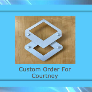 A custom artwork featuring geometric metal shapes on a wooden surface, framed in blue with the text "Custom Order For Courtney.