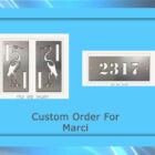 A custom order featuring two panels with crane designs and a house number plaque with "2317," displayed on a blue background with the text "Custom Order For Marci" below the items.