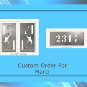 A custom order featuring two panels with crane designs and a house number plaque with "2317," displayed on a blue background with the text "Custom Order For Marci" below the items.