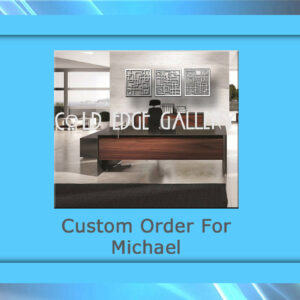 An office setting with a modern wooden desk and a chair behind it. The words "COLD EGE GALLERY" and "Custom Order For Michael" are displayed over the image, highlighting a custom piece of metal artwork.