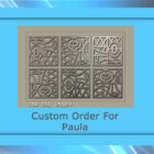 Image of a framed artwork with intricate geometric patterns. Text below the artwork reads "Custom Order For Paula" and "Cold Edge Gallery." The frame is blue with a gradient background, highlighting the meticulous detail of the custom metal design.