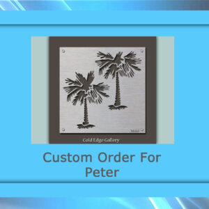 Metal frame with laser-cut palm trees from Cold Edge Gallery, labeled "Custom Order For Peter." This custom artwork is elegantly framed in a blue border.