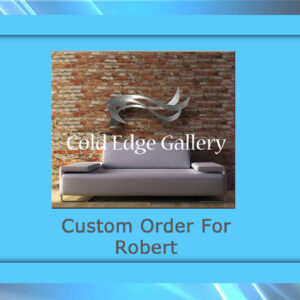 A light gray couch placed against a brick wall with a metallic abstract artwork piece above it. "Cold Edge Gallery" text overlay. Below the image, the text reads "Custom Order For Robert.