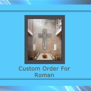 A framed artwork featuring a metallic cross on a gray wall is displayed in a blue frame. Text reads "Custom Order for Roman" and "Cold Edge Gallery." A custom wooden table and chairs are beneath the cross.