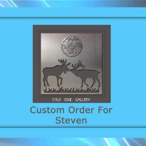 A metal art piece featuring two deer with antlers facing each other under a full moon. The text reads "Cold Edge Gallery" and "Custom Order For Steven.