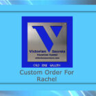 A sign for Victorian Secrets Vacation Rental features a metallic 'V' logo. The custom artwork includes text that reads "Custom Order For Rachel" and the website victoriansecretstv.com. At the bottom, it says "Cold Edge Gallery.