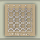 A metallic grid with circular patterns is suspended against a beige backdrop, accompanied by the text "Cold Edge Gallery" at the bottom.