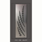 A rectangular metal panel with an abstract design of variously sized holes and curves, displayed on a dark background with the text "COLD EDGE GALLERY" at the bottom.