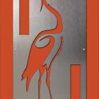 An art piece featuring an orange heron cutout on a metal background with labels "8-202" and "Michaels," and the text "Cold Edge Gallery" at the bottom.