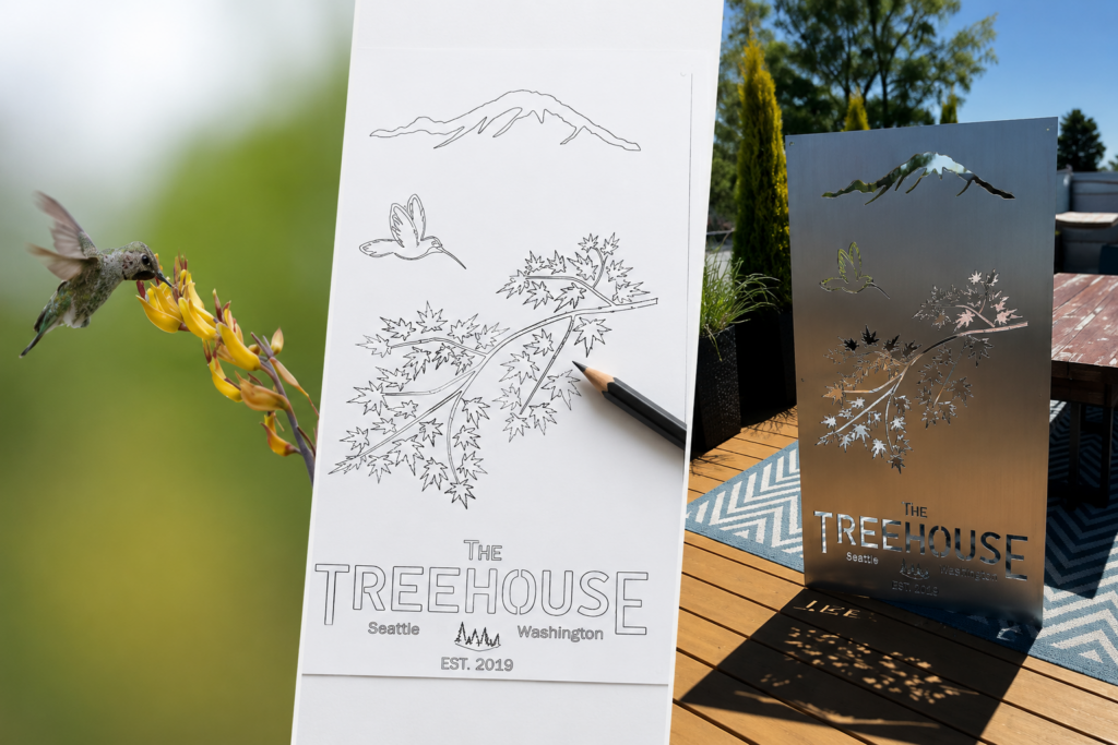Hummingbird, sketch, and finished metal sign showing “The Treehouse” design with mountain, bird, leafy branch, and “Seattle Washington Est. 2019” text.
