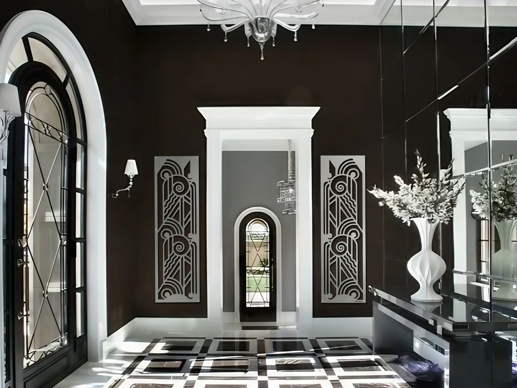 Elegant entryway with black walls, decorative mirrors, and a white vase filled with flowers.