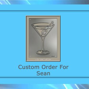 A metallic artwork of a martini glass with a cherry, labeled "Custom Order For Sean.